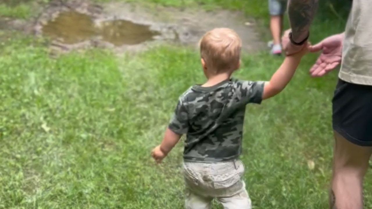 Toddler Slip in Puddle: A Hilarious Fall Caught on Camera || WooGlobe