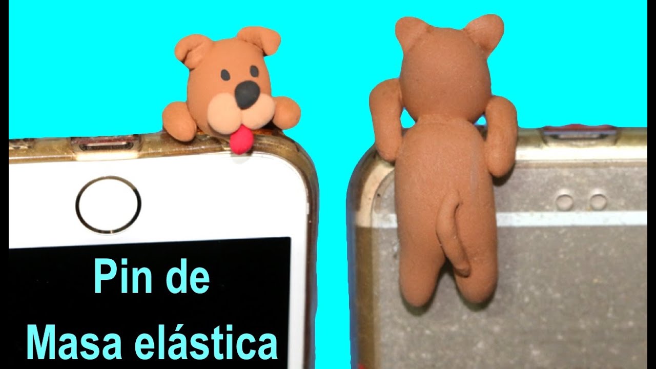 Pin para móvil antipolvo. Anti-dust plug jumping clay dog