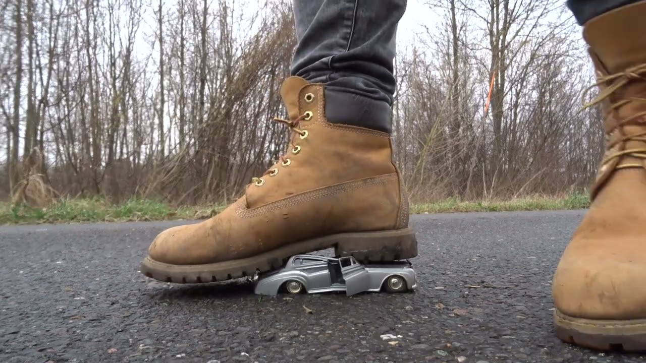Timberland Boots stomp, trample and destroy vintage model toy car