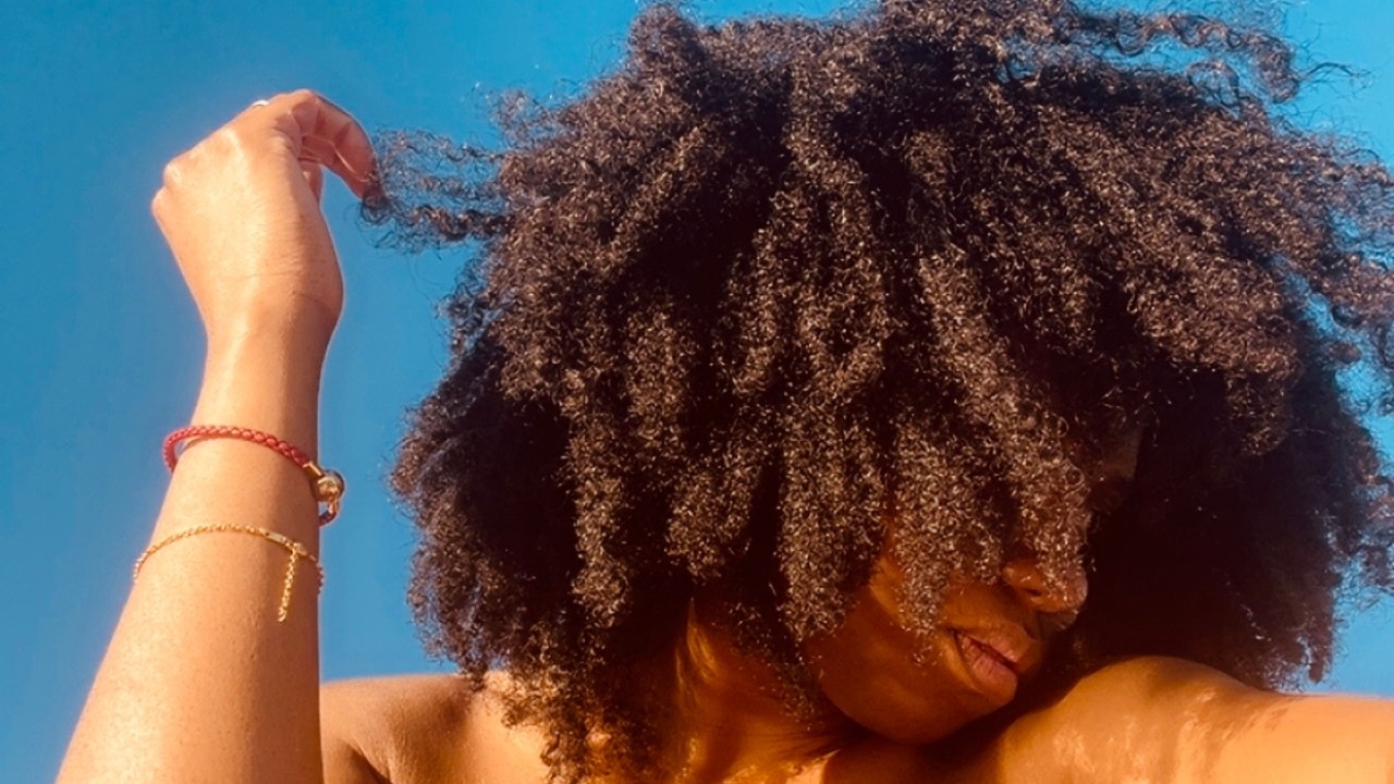 How I'm Growing My Natural Hair Without Protective Styles