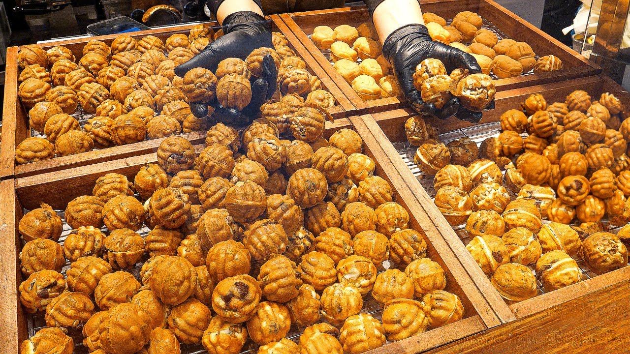 Хрустящие снаружи сладкие внутри Печенье с грецкими орехами визитная карточка корейской уличной еды.