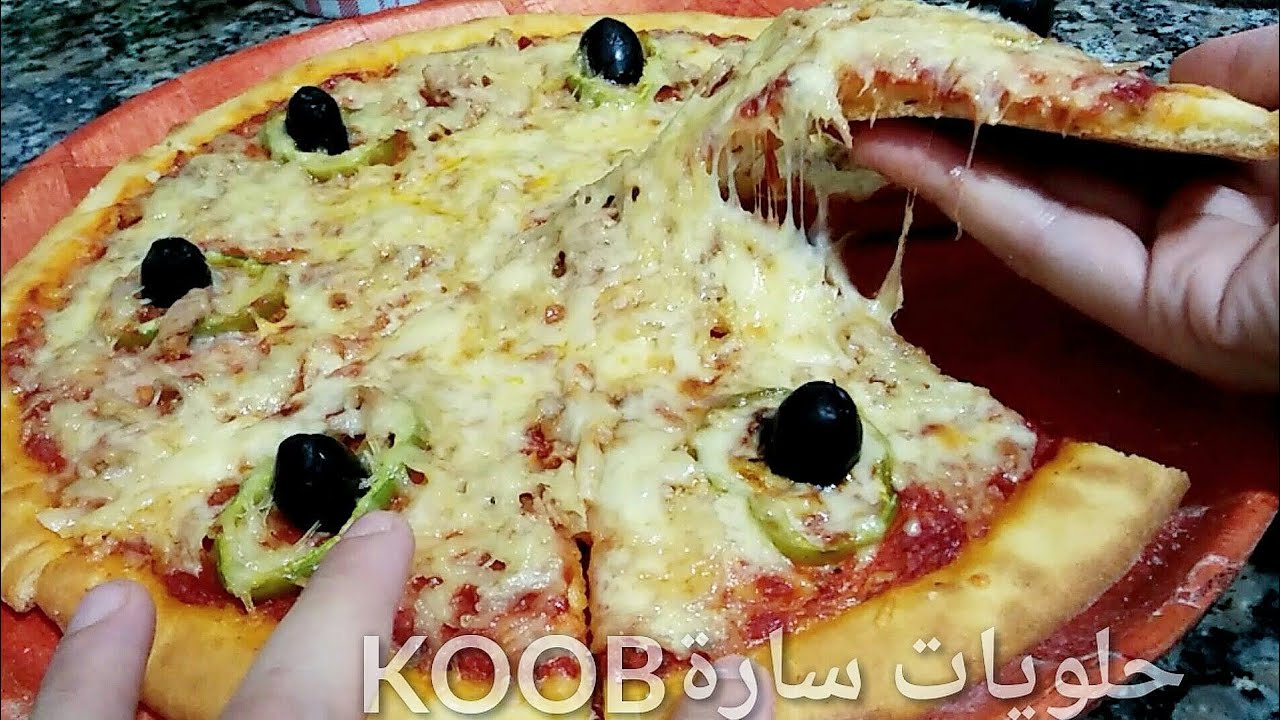 بيتزا معشوقة الجماهير😍باسهل طريقة و بعجينة سحرية هشة من دون دلك والنتيجة خياااالية
