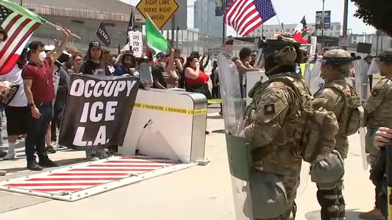 Anti-Trump protesters march in LA during 'Rage Against the Regime' rally