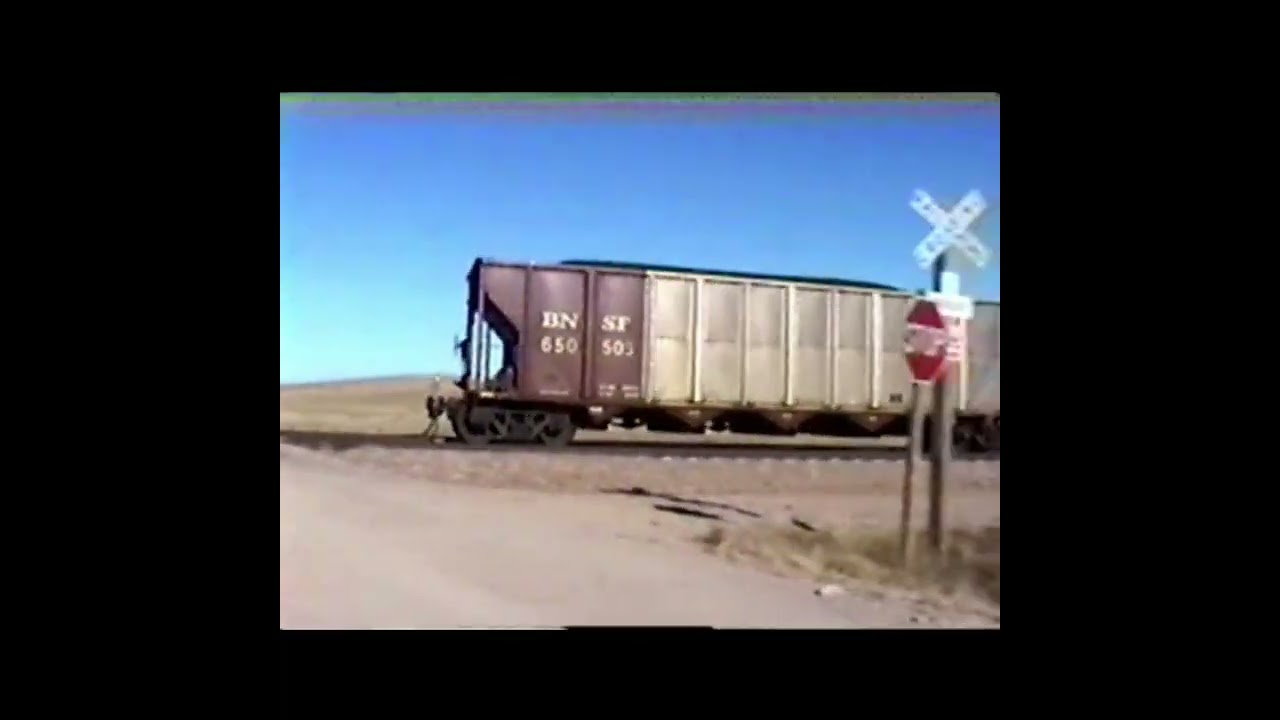 BNSF 9957 meets BNSF 9695 west of Cairo on December 20,2003