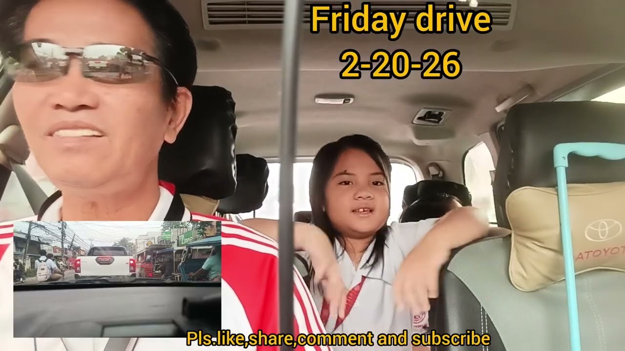 Driving kids to school in an early traffic drive.