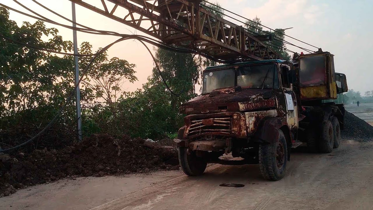 Latest project: Long boom crane, CAT excavator for digging earth.