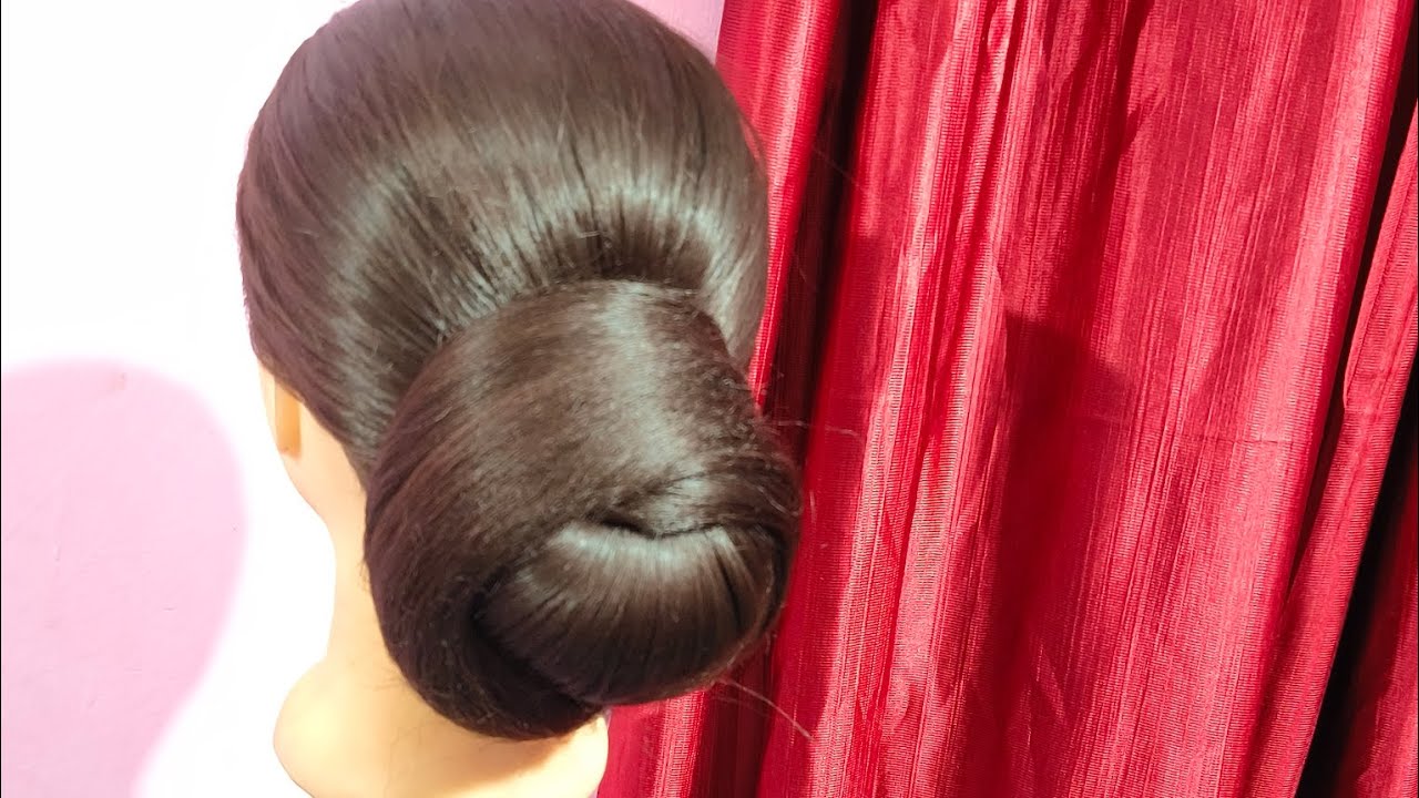 Hairstyle for wedding and parties #hairstyle #weddingbeauty #beautiful #bunhairstyle 