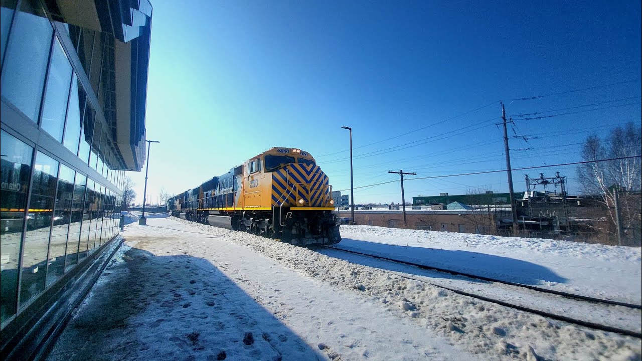 ONR 113 leaving at the train station with units ONR 2123 leading, ONR 2101, and ONR 2124