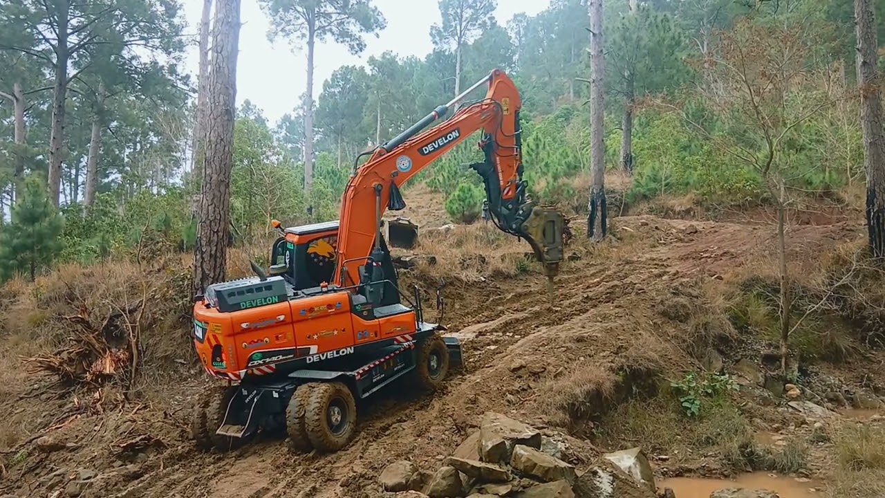 Excavator is climbing on the slipy road in moutains jungle #jungle #automobile #excavator 