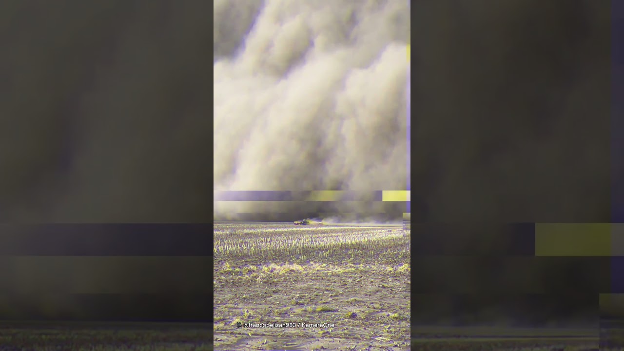 Massive dust storm looms after tractor 😳