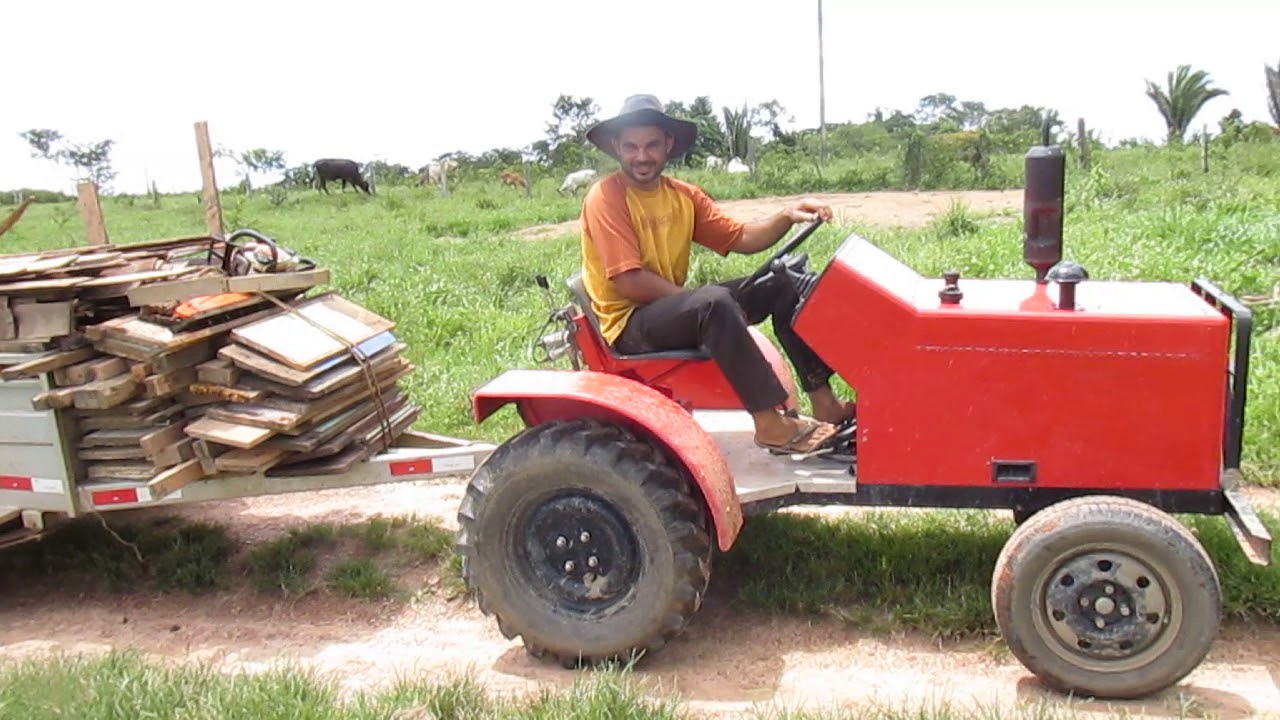 trator com motor de moto 150 flex (teste de força )