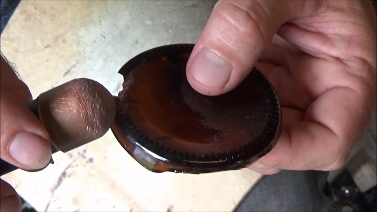 how to make an arrowhead from a beer bottle part 1