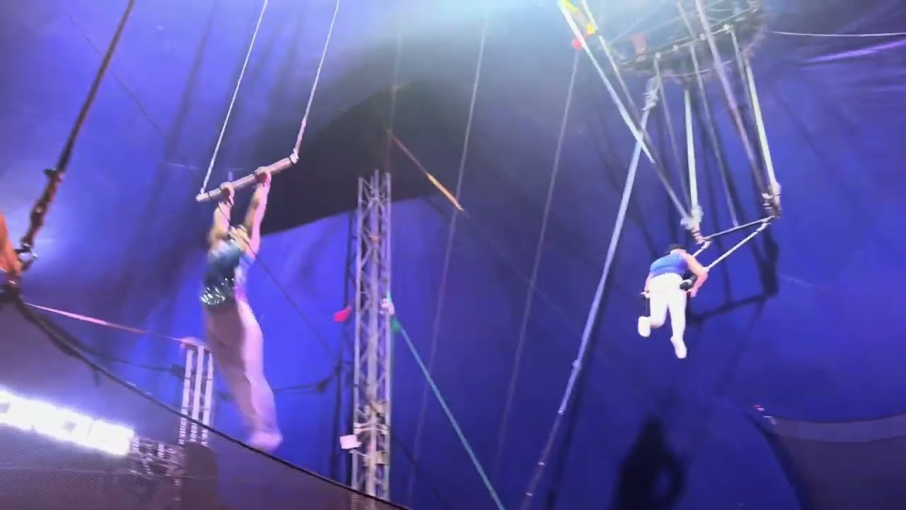 The woman is tumbling a lot in the air