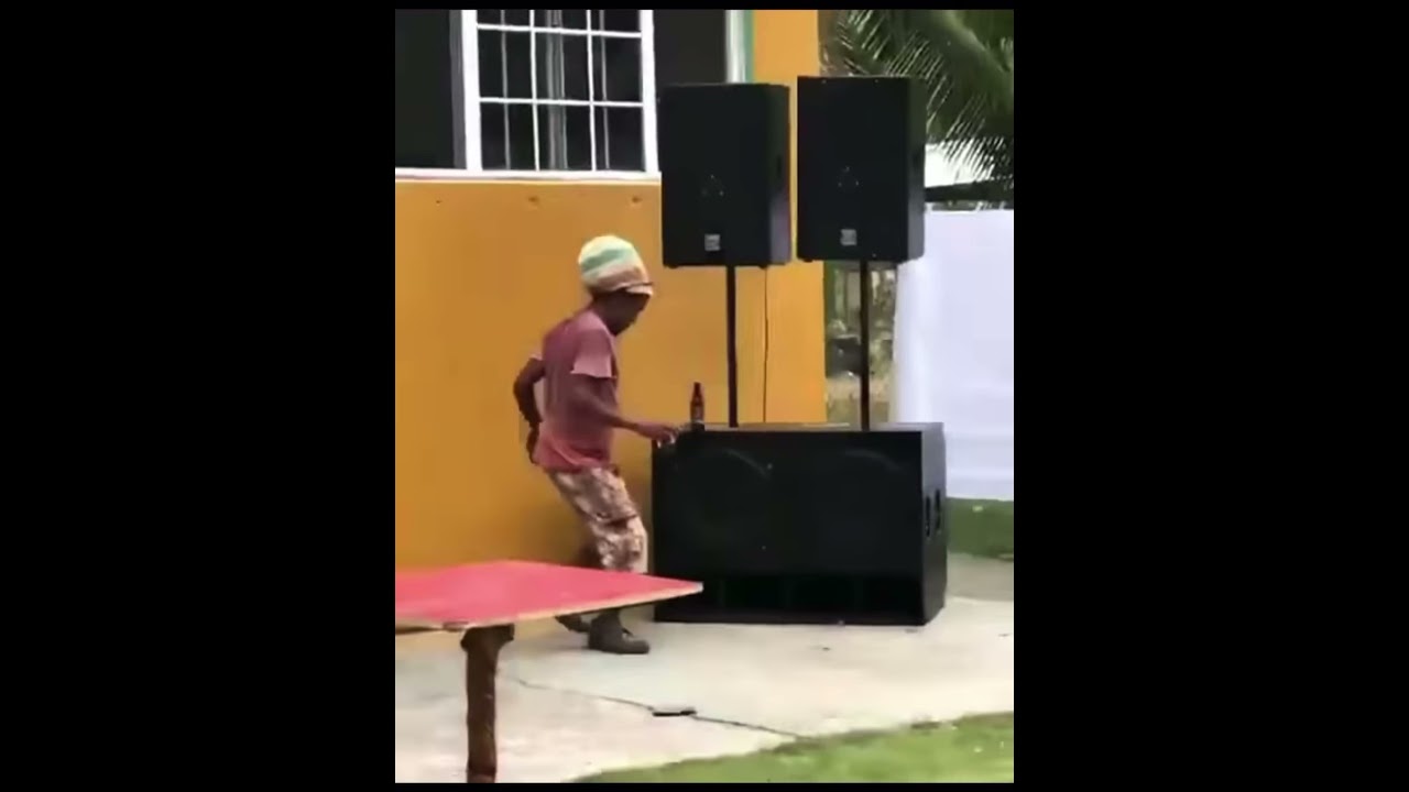 Rastaman dancing to bob Marley natural mystic