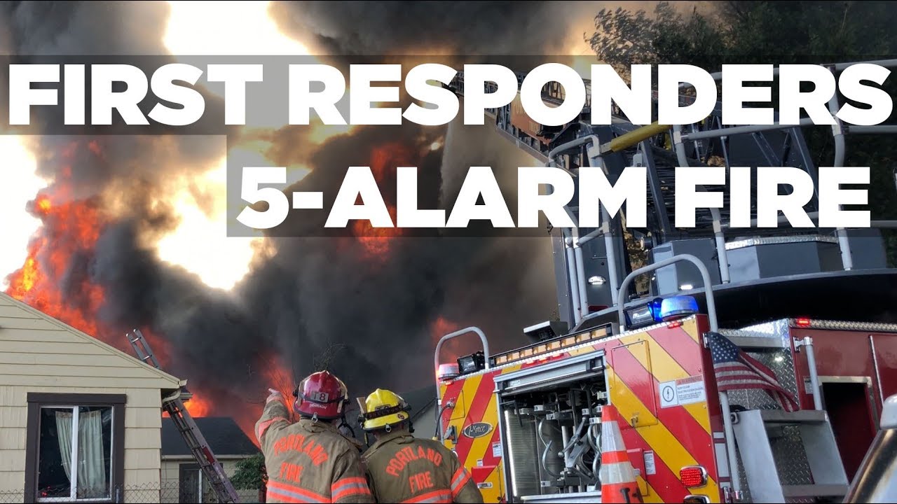 First Responders attacking 5-Alarm Fire in NE Portland in Auto Wrecking Yard Destroys Apartments