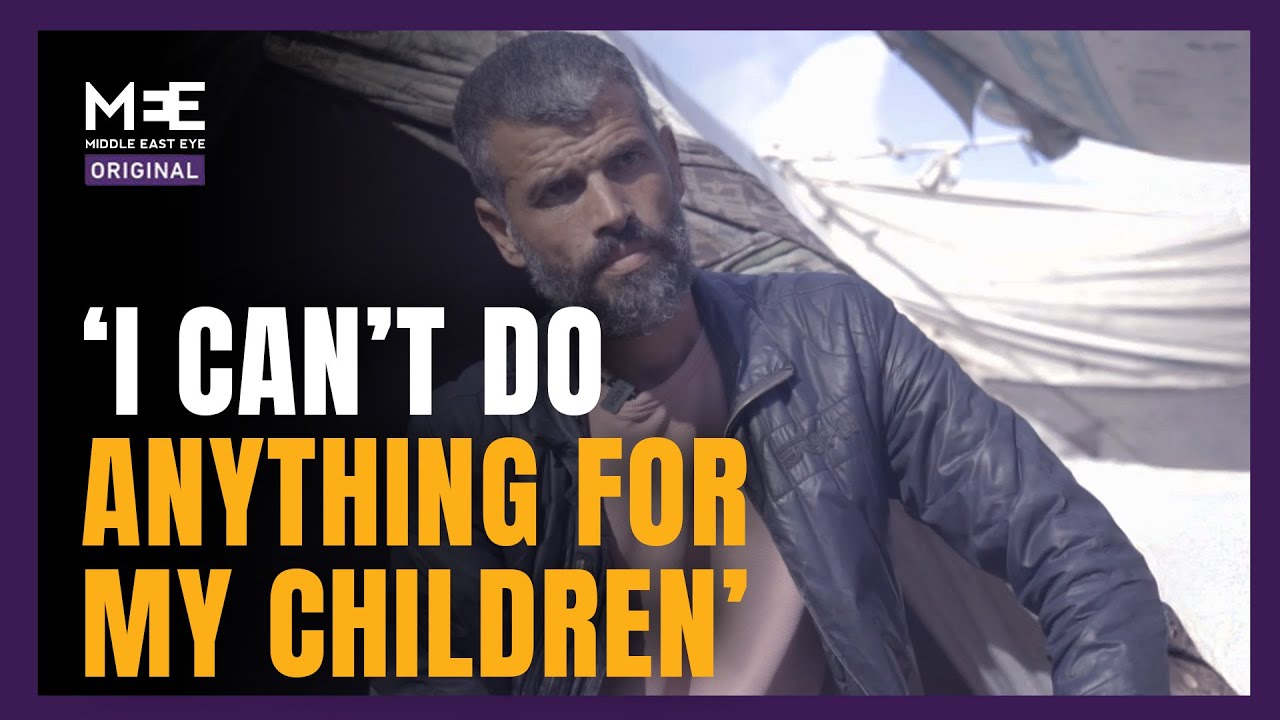 Displaced Palestinian family lives in a tent damaged by rain and cold weather