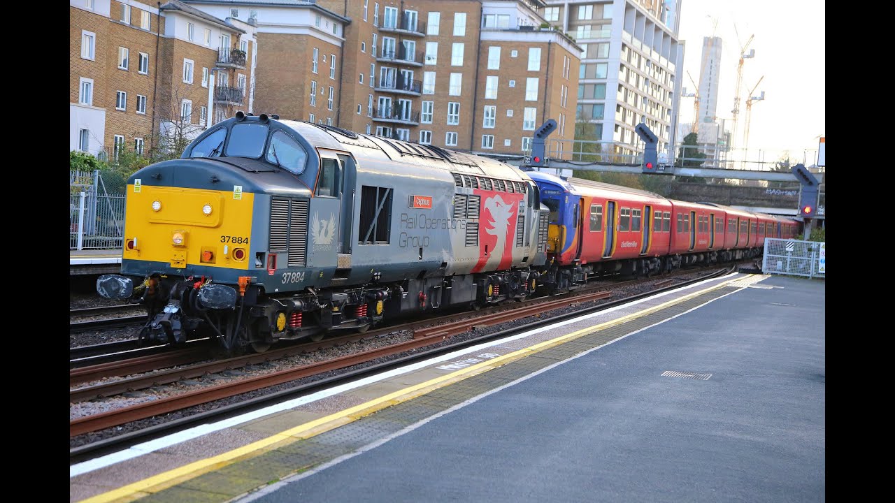 37884 hauling 455720 & 455709 pass Kensington Olympia on 5Q57 to Deby Litchurch Lane   10/12/25