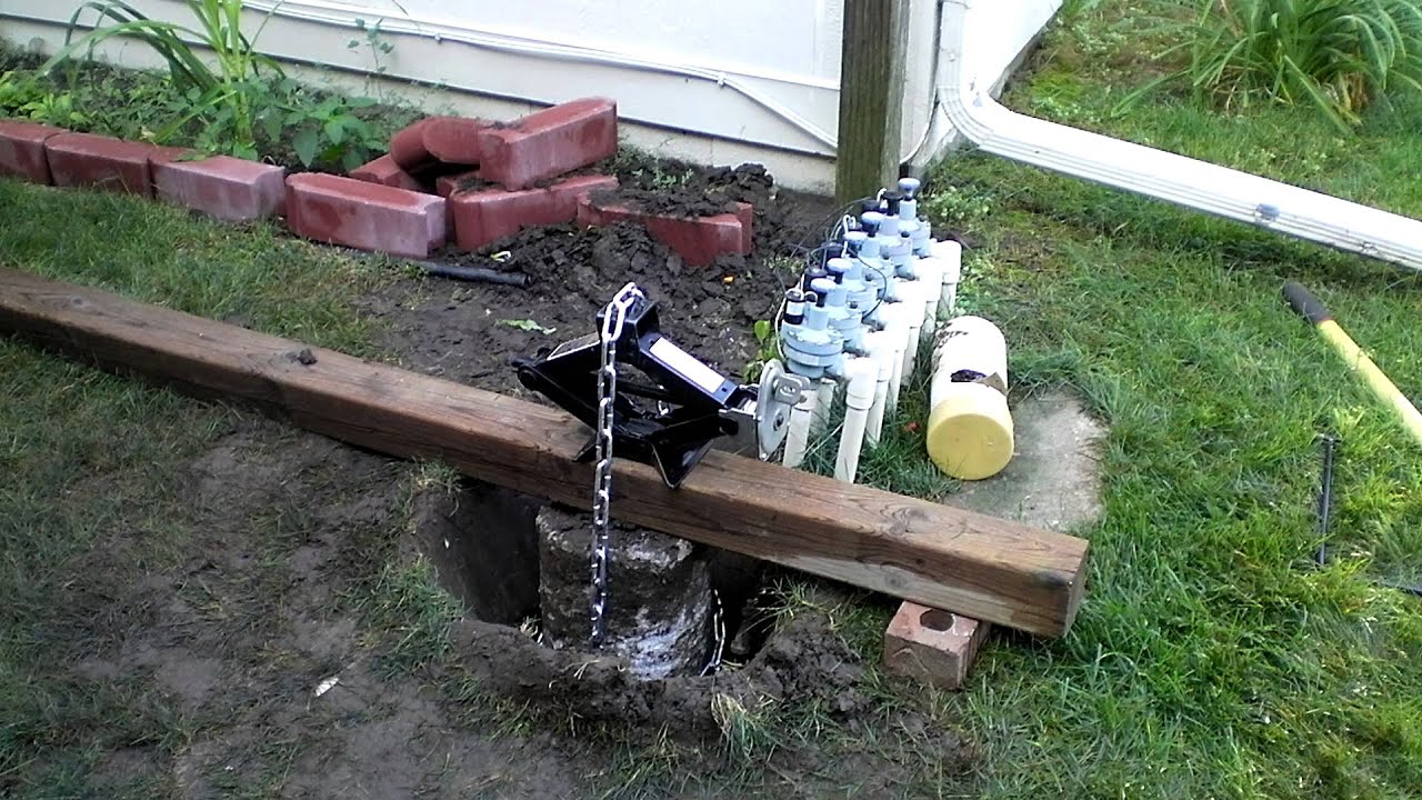 Removing fence post cement from ground