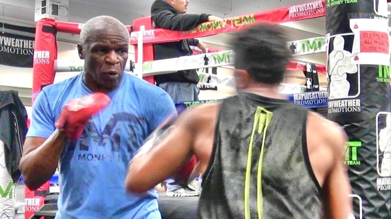 Floyd Mayweather Sr. working on the shoulder roll w/ undefeated Darren Cunningham