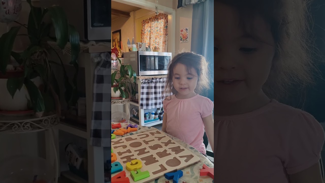Rosie with her alphabet puzzle