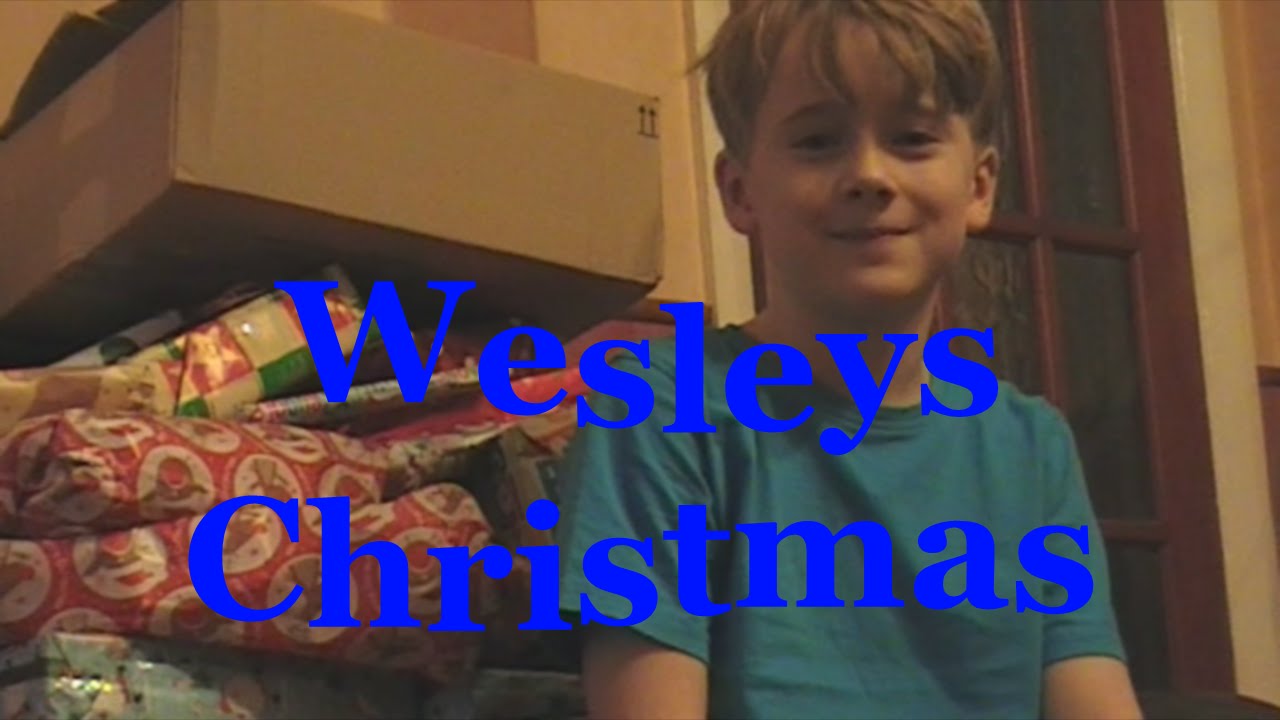 My Sons Christmas Day Unwrapping of presents 2014
