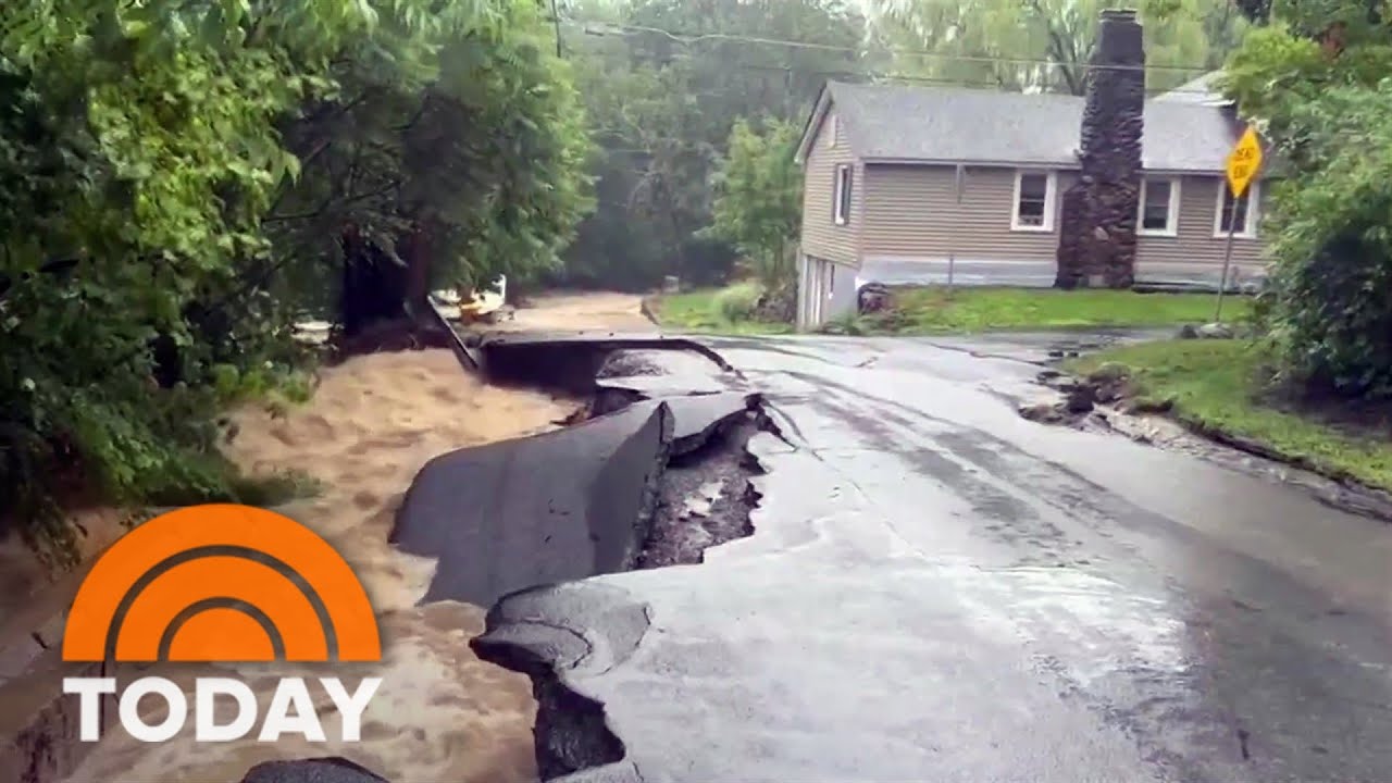 Northeast flooding washes away cars, collapses roads