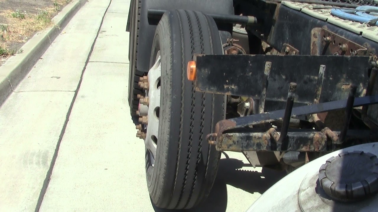 how a pusher axle works