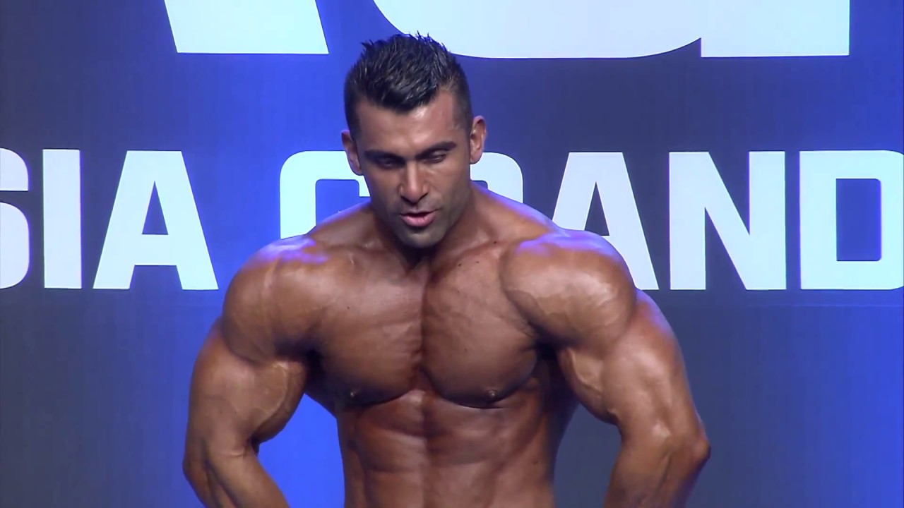 2016 AGP Bodybuilding 212 Sam Mohammad posing
