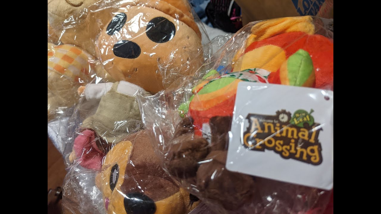 Unpacking a bag of animal crossing plushies!