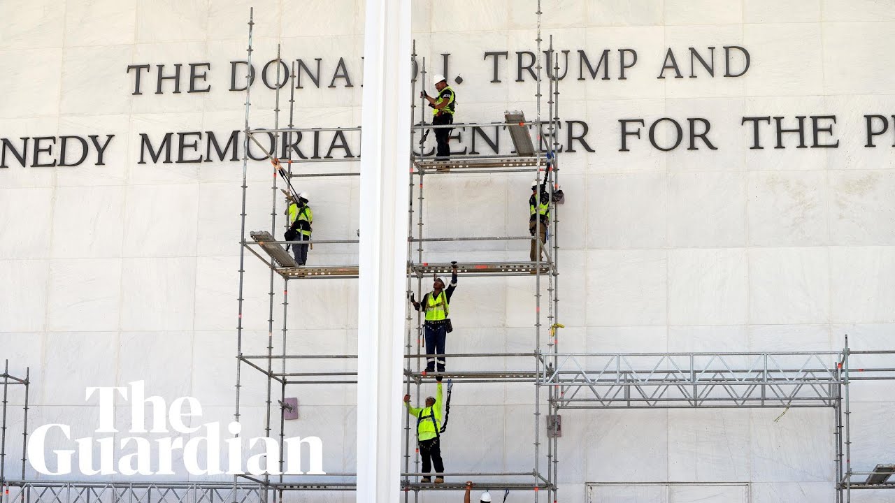Workers set up scaffolding outside Kennedy Center