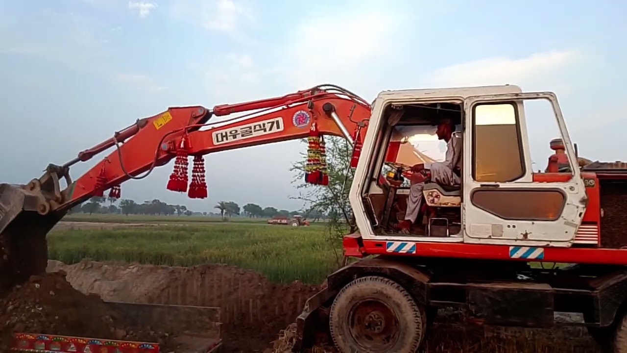Soothing Excavator ASMR: Soil Loading into Truck Calming Excavator ASMR: Dirt Being Loaded by Machin