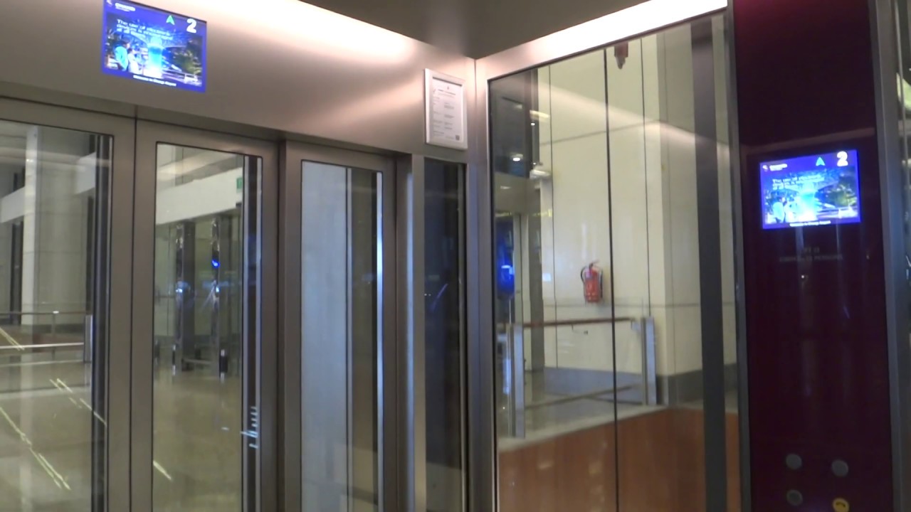 Singapore Changi Airport, Terminal 1 - Schindler 5500 MRL Panoramic Elevator