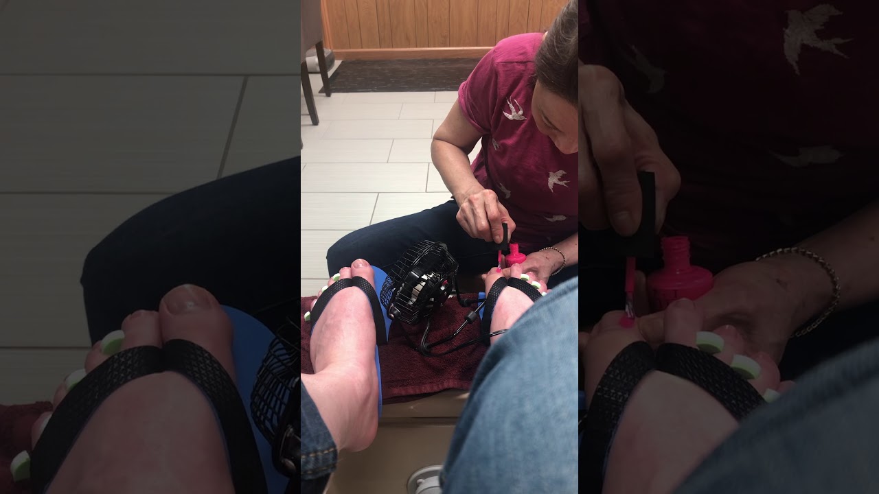 Guy getting pedicure with nail polish
