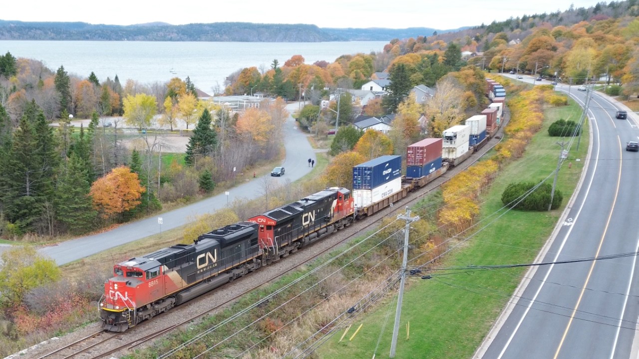 Awesome Aerial 4K View! Big Manifest Train CN 594 West w/Containers passing Renforth, NB