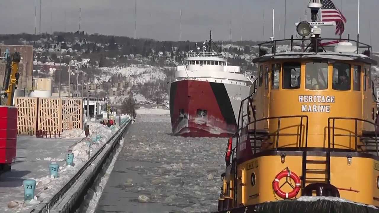 Duluth Shipping News rides the Heritage tug Nels J. while she breaks ice for the Callaway