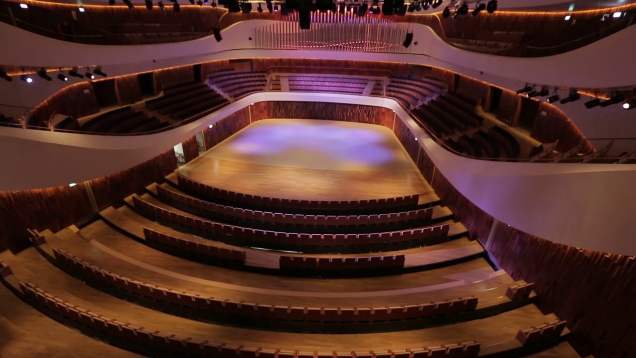 Curved row seating system for ZARYADYE Philharmonic Concert Hall - Moscow