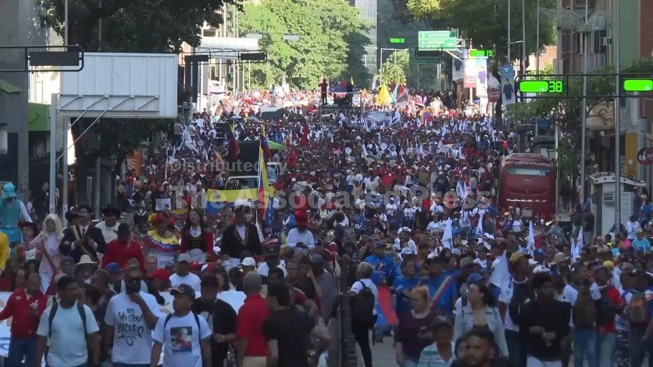 Venezuelan government supporters march in Caracas a month on from Maduro's capture by US