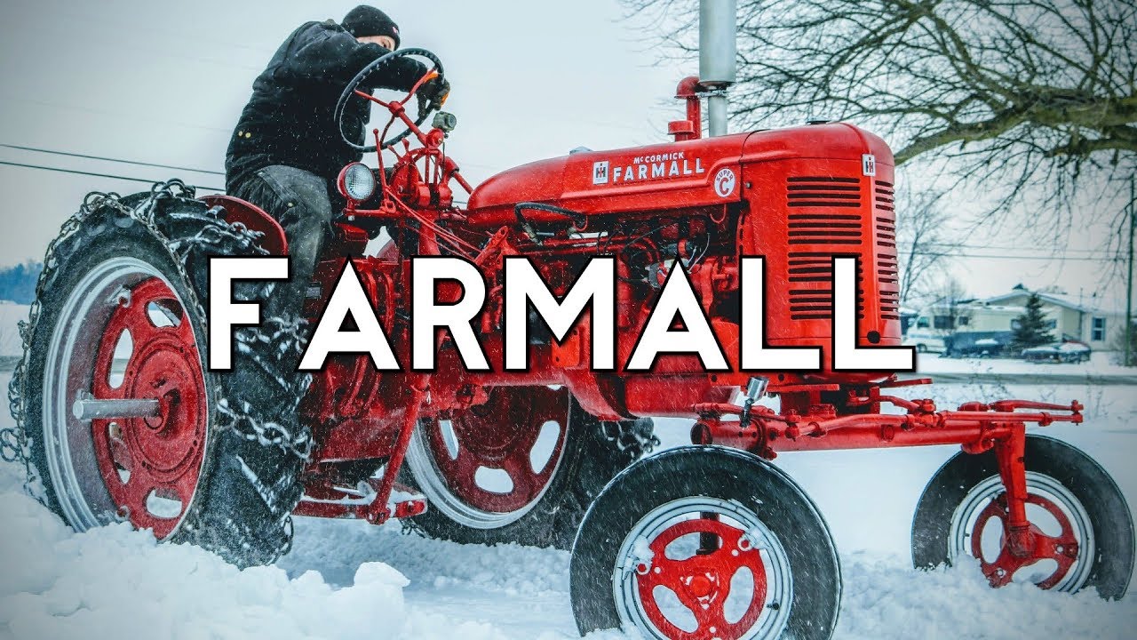 Farmall Super C Plowing Snow