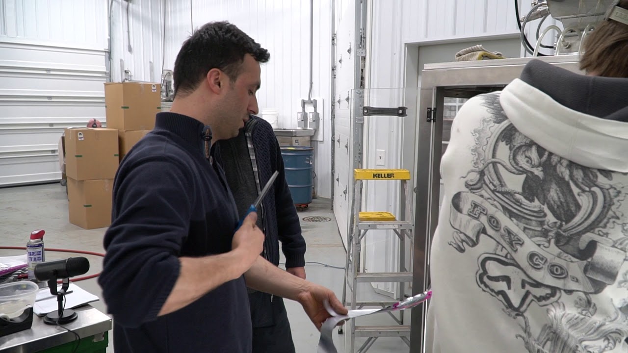 Turpack - how to feed film around the fill tubes on stick pack maching