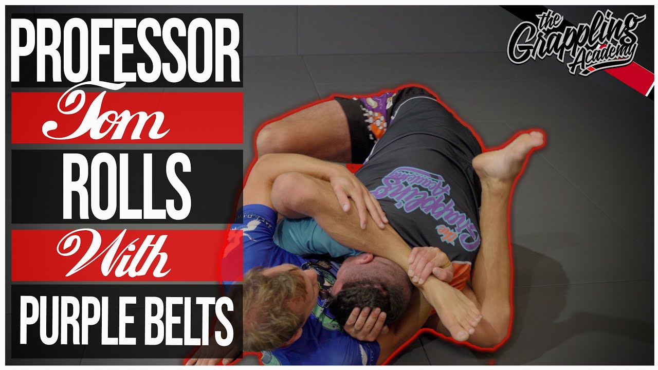Professor Tom Rolling With Purple Belt Students 2