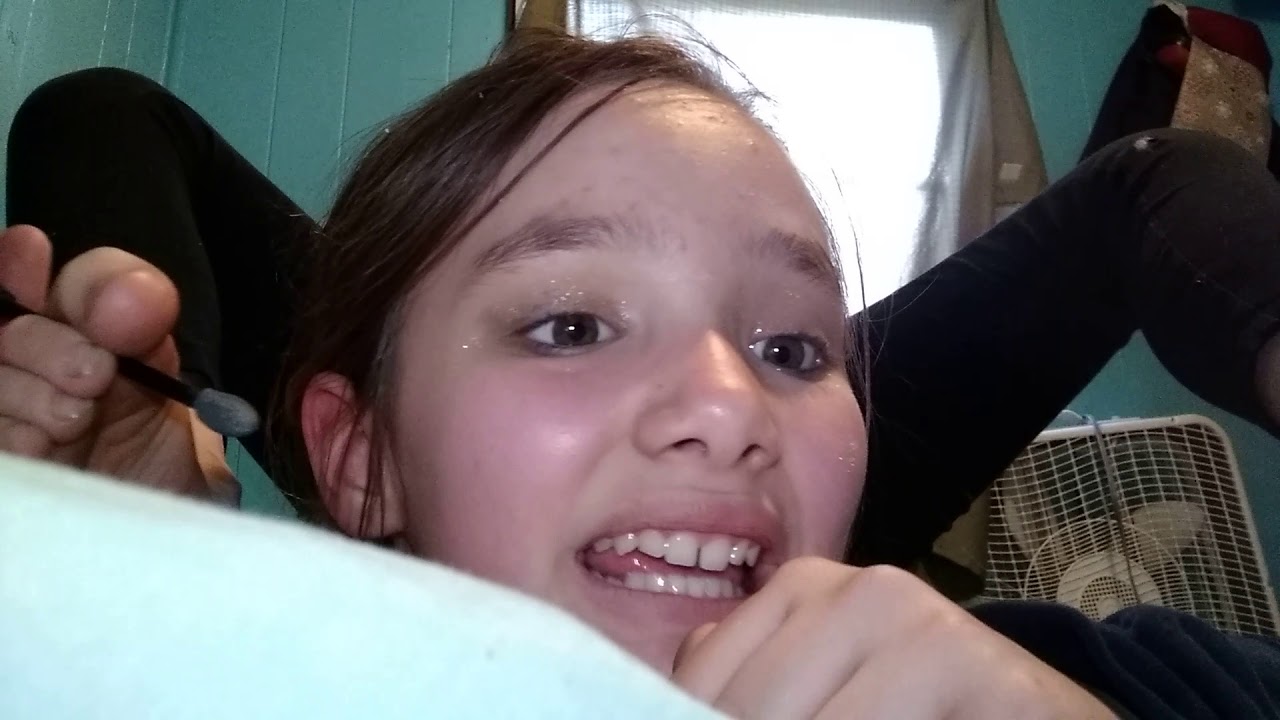 Doing my makeup with my feet sorry guys this is in the best footage I didn't feel good