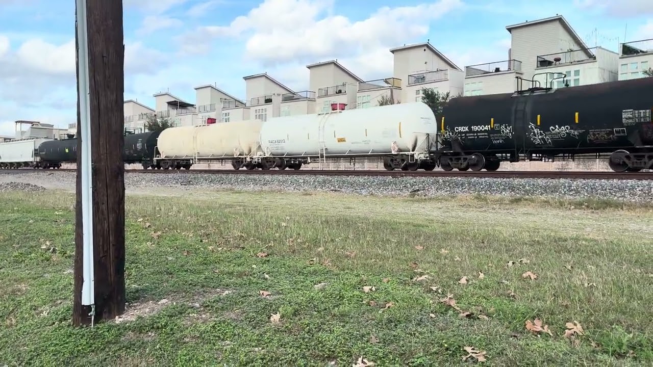 Union Pacific 2548 Leads while Union Pacific 8921 Trails Long Mixed Train.
