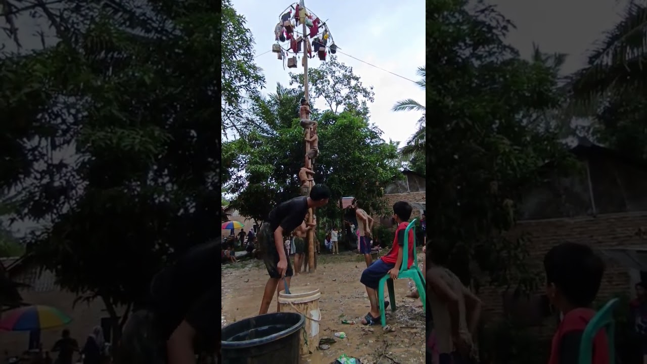 ACARA PERLOMBAAN PANJAT PINANG DALAM RANGKA MEMERIAHKAN HARI RAYA IDUL FITRI 2025 DI KP.CIKANDE