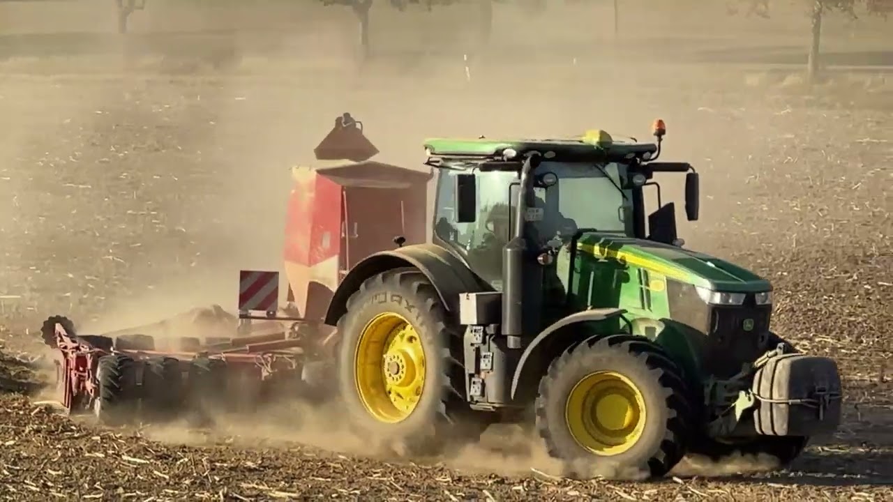 S&auml;maschine Kverneland u-drill 6000 gezogen von John Deere 7310 R