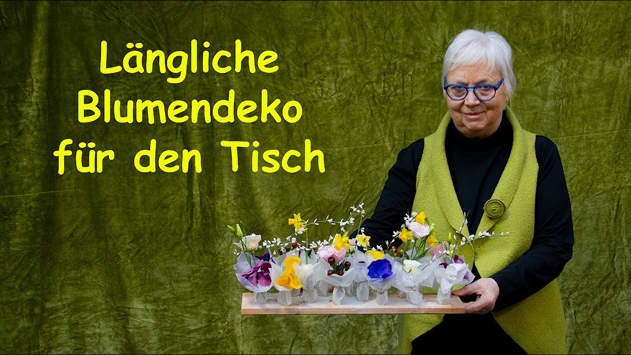 Längliche Blumendeko für den Tisch mit frischen Blumen selber machen