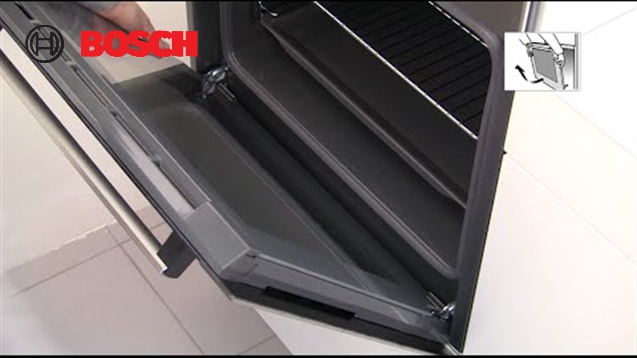 How do I clean my oven door?