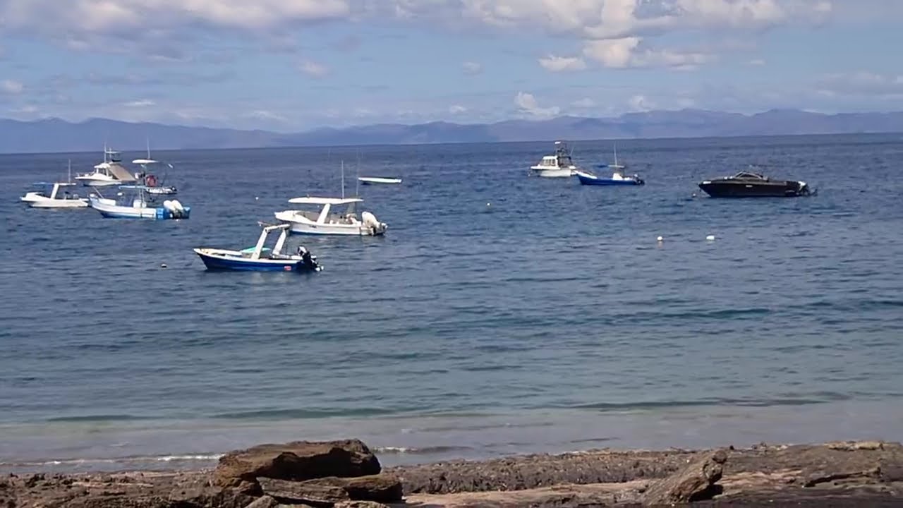 The Beach and boats in the bay at Ocotal Beach,Costa Rica