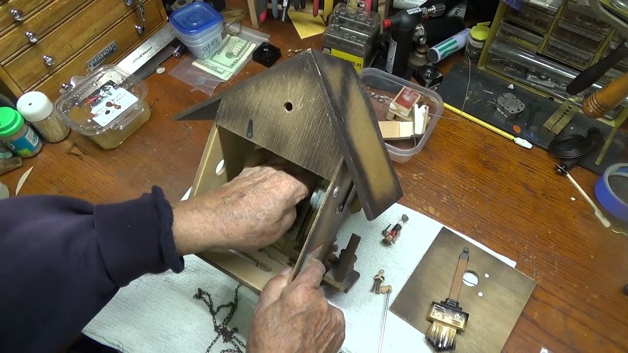 Regula Cuckoo Clock with Woodchpper, Dancers and Waterwheel