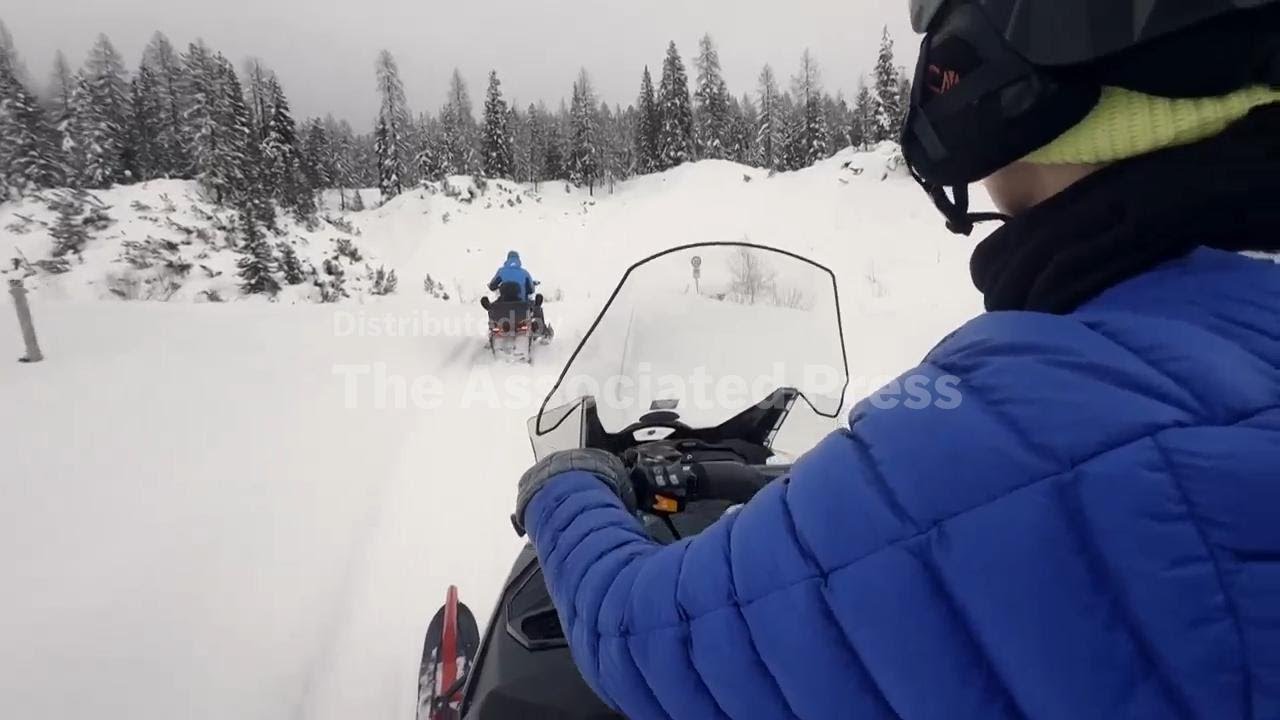 Exploring the peaks near Winter Olympics mountain venue on an 'Uber Snowmobile'