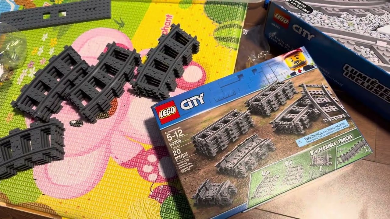 How do you get the tracks apart in a Lego train set?